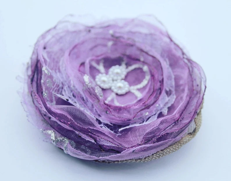 Purple fabric flower brooch